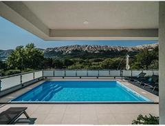 Aruba-glasfiberpool – rektangulær form, blåt vand, grå kanter