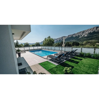 Rektangulär blå Aruba Plus trädgårdspool 8x3,7m med klart vatten