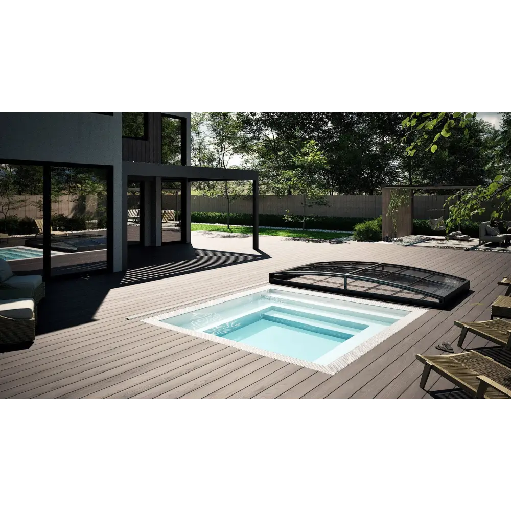 Rektangulär minipool wellness pool med svart kant och blåvatten