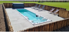 PassionSpa Aquatic 6-swimspa – hvid overflade, turkisblåt vand, sorte massagedyser
