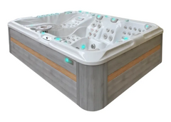 PassionSpa Ecstatic Mighty Wave-spabad – moderne design, grå træpaneler, hvid inderside, turkis LED-belysning, regulering af massagedyser