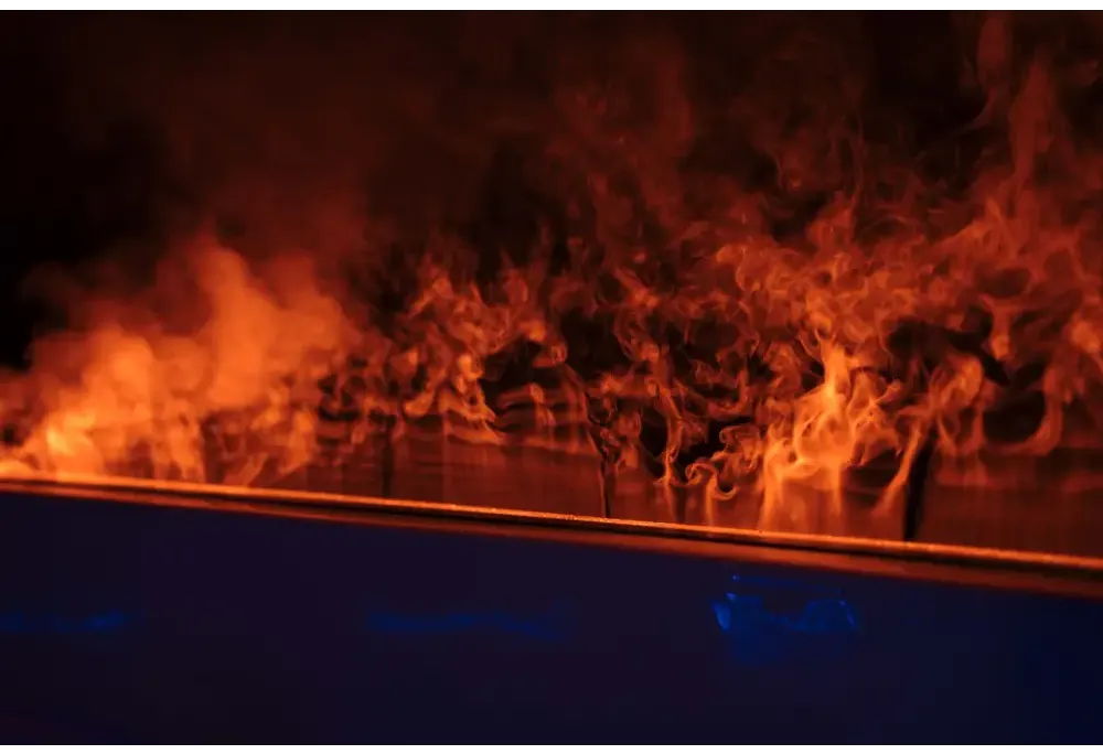 PassionSpa Serene 6-spabad – ildsted, orange flammer, mørk overflade