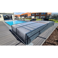 Modern grå pooltäckning ICON 4x8 uden ramme klarplast antracit med genomskinliga, fläckiga paneler och slät metallram