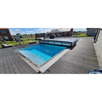 Pooltak ICON 4x8 uden ramme klar med klarblått vatten och svart ram i grå trädäck