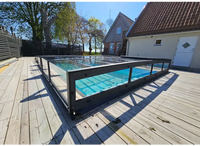 Icon Kit-pooltag – sort ramme, tag med klare paneler, blåt vand