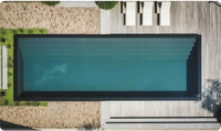 Rektangulär infinitypool ovanmark PP med 20mm skimmer, djup tealvatten och svarta kakelkanter