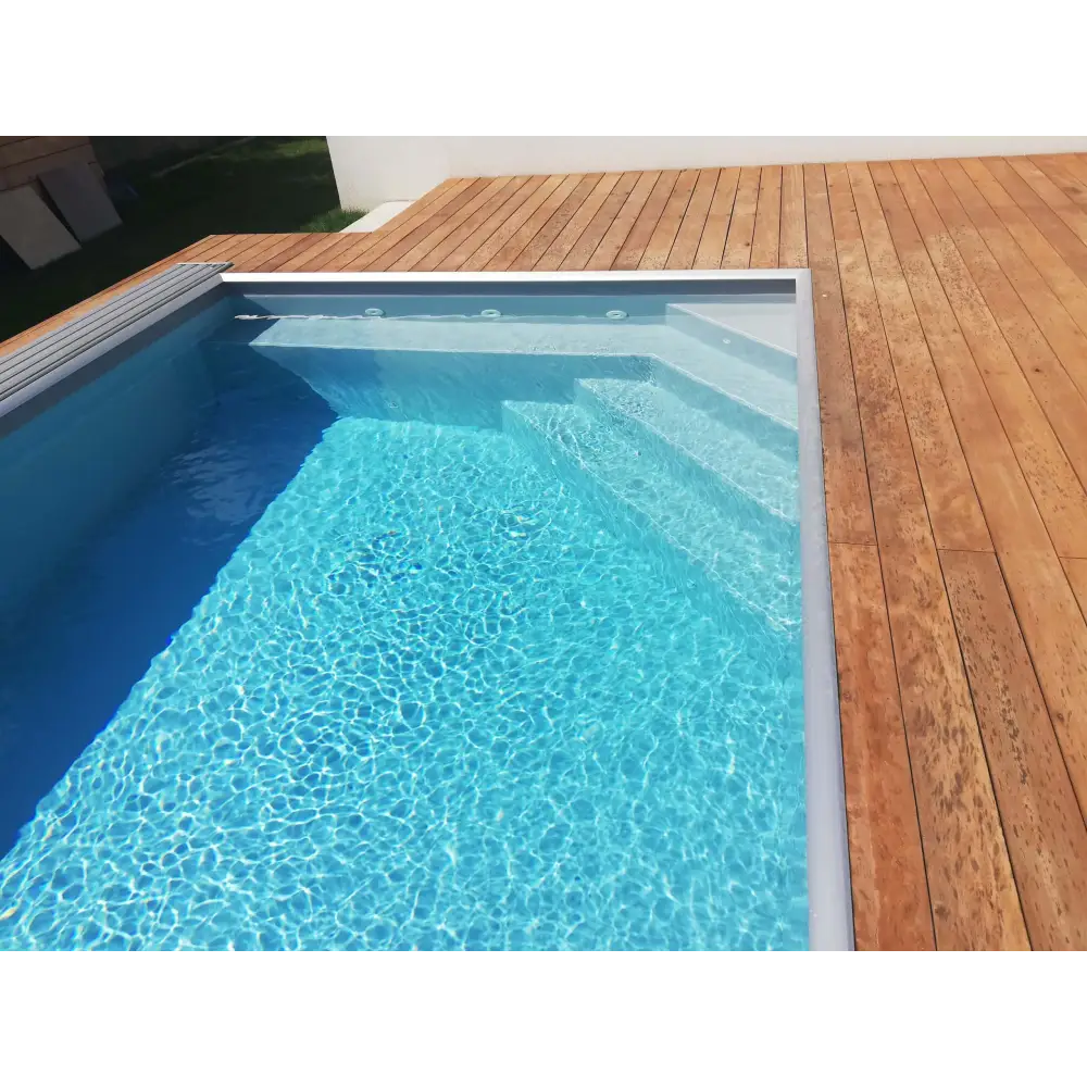 Pooltime Exklusiv 12 mm PP-pool 4x12x1,5 m med klarblått vatten och trädäck