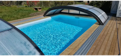 Pooltime Exclusive-pool, 12 mm – rektangulær form, turkisblåt vand, hvælvet design, pooltag