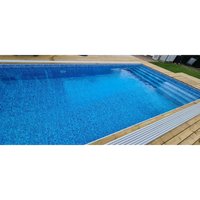 Thermopool Standard Plus rektangulär pool med blå mosaik och trädeck