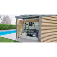 Svart cylindrisk ThermoPP Poolpaket QBIG poolfiltertank i modern utetablå